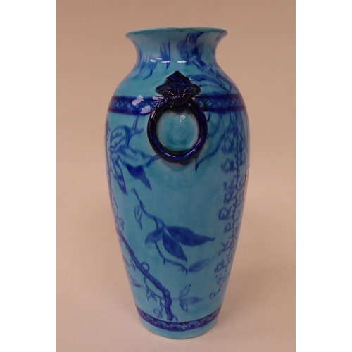 77 - A late 19thC Minton's china vase of baluster form, decorated in tones of blue with opposing, moulded... 