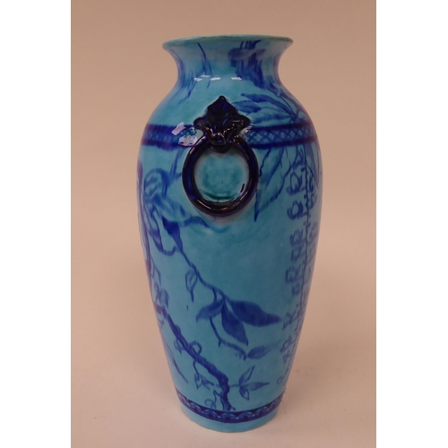 77 - A late 19thC Minton's china vase of baluster form, decorated in tones of blue with opposing, moulded... 