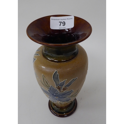 79 - .An early 20thC Doulton Lambeth stoneware vase of shouldered baluster form with a flared neck and de... 