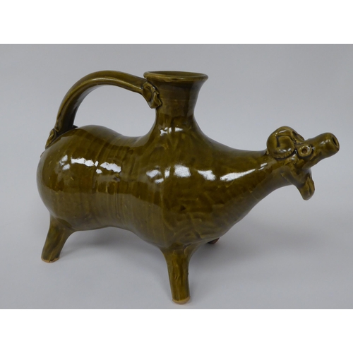 86 - A 20thC Chinese green glazed pottery animal pouring vessel, possibly Zhejiang Province  6.25