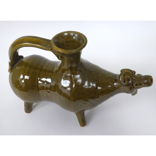 86 - A 20thC Chinese green glazed pottery animal pouring vessel, possibly Zhejiang Province  6.25