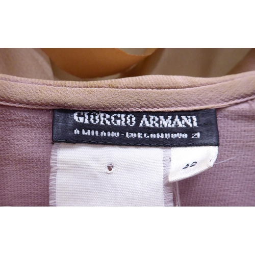 264 - Ladies fashion items: to include a Chanel skirt; and another by Giorgio Armani  size 44