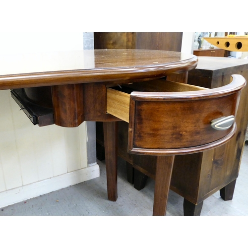 398 - A modern mahogany finished kidney shaped desk with twin pedestal, one with a drawer, the other, a dr... 