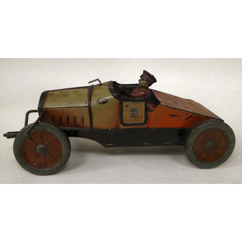 12 - A Hess 1020 Hessmobile tinplate clockwork model car