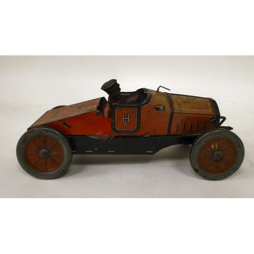 12 - A Hess 1020 Hessmobile tinplate clockwork model car