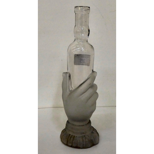 25 - In the manner of Legras, a French clear and frosted glass novelty candle holder, fashioned as a hand... 