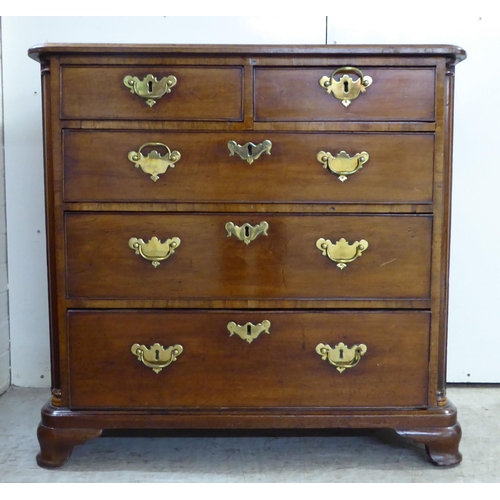 290 - A George III crossbanded mahogany, five drawer dressing chest, raised on bracket feet  32