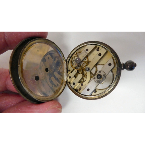 293 - A white metal cased pocket watch, inscribed Bennett, Cheapside, London, faced by a white enamel Roma... 