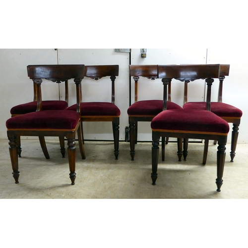 294 - An early Victorian mahogany breakfast table with a tip-top, over a turned column and splayed legs  2... 