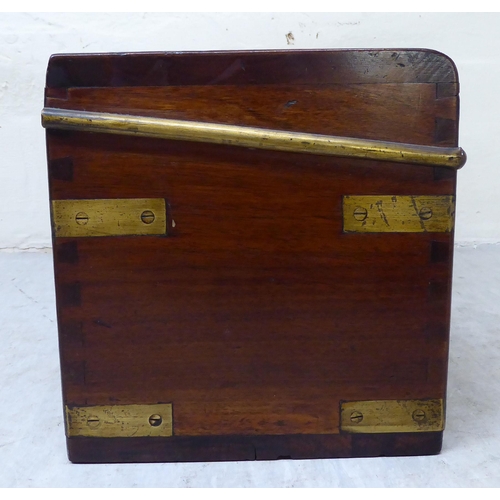 304 - A 19thC military/campaign style brass bound mahogany box with straight sides and a hinged lid, enclo... 