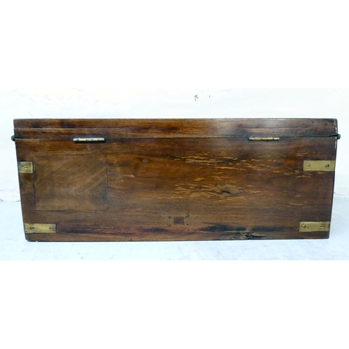 304 - A 19thC military/campaign style brass bound mahogany box with straight sides and a hinged lid, enclo... 