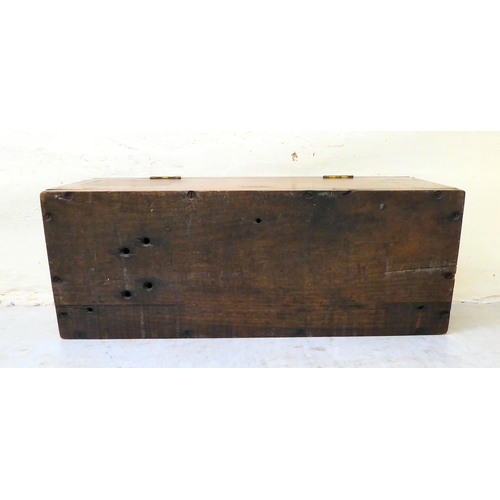 304 - A 19thC military/campaign style brass bound mahogany box with straight sides and a hinged lid, enclo... 