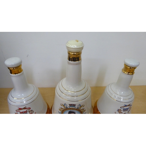 38 - Bells Scotch Whisky, in Wade decanters: to include one to celebrate the 90th Birthday of HM The Quee... 