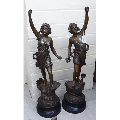 383 - Two pairs of spelter figure clock garnitures  14