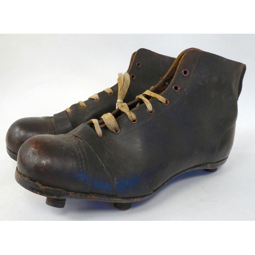 391 - A pair of vintage stitched brown hide, laced football boots with studs  size 8