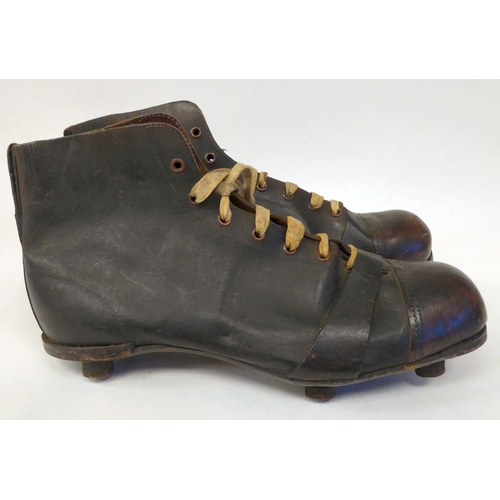 391 - A pair of vintage stitched brown hide, laced football boots with studs  size 8