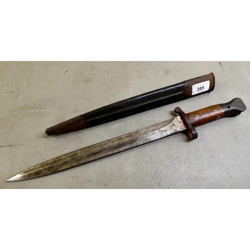 395 - A King George V period bayonet  the blade 12