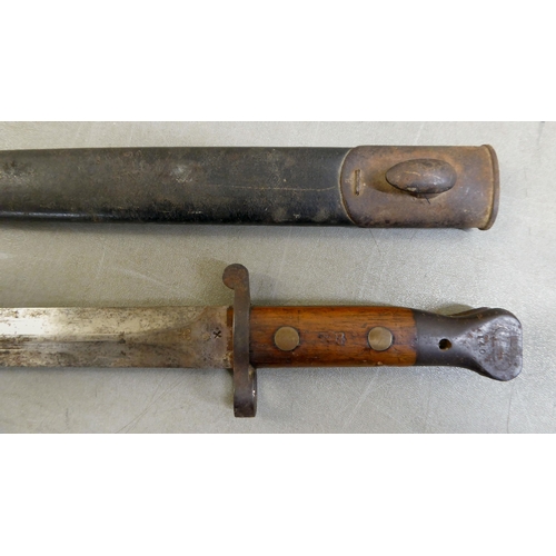 395 - A King George V period bayonet  the blade 12