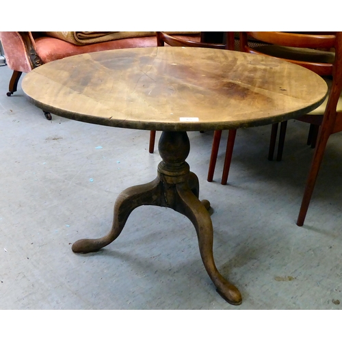 65 - A George III mahogany tip-top pedestal table, raised on a tripod base  24