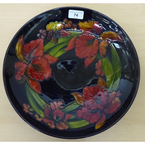 74 - A Moorcroft pottery Orchid pattern shallow bowl  12