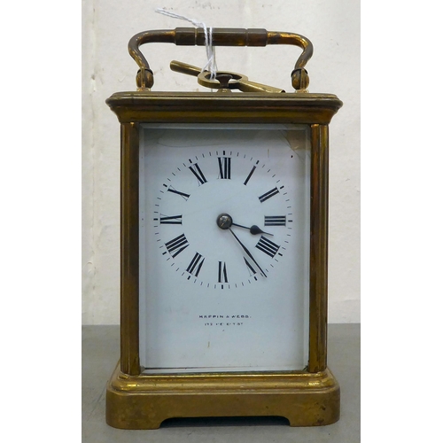 75 - A Mappin & Webb brass cased and glazed carriage clock; the movement faced by a Roman dial  7