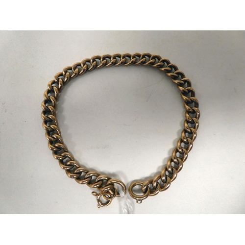 9 - A 9ct gold curb link bracelet