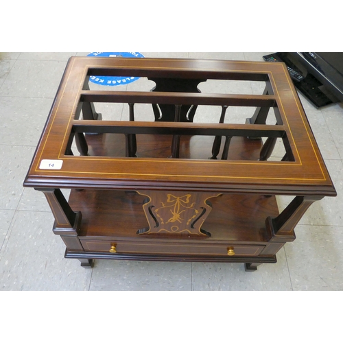 14 - An Edwardian style string inlaid, mahogany three division Canterbury, over a long drawer, raised on ... 