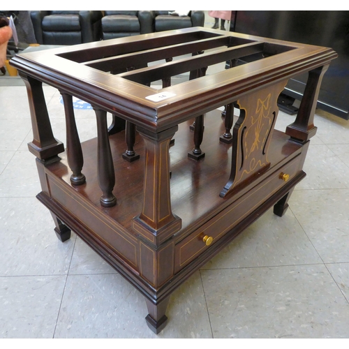 14 - An Edwardian style string inlaid, mahogany three division Canterbury, over a long drawer, raised on ... 