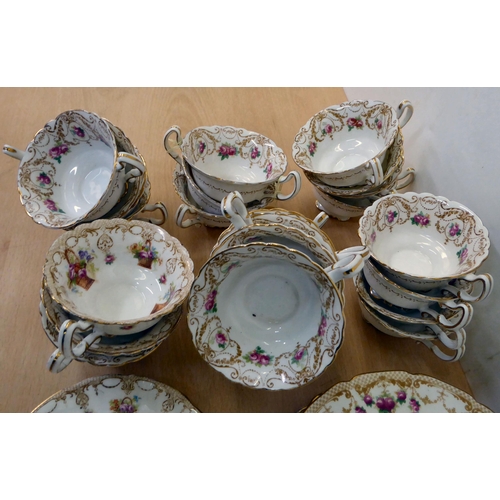 15 - Edwardian Royal Doulton china tableware, decorated with C-scrolled, floral and foliate designs with ... 