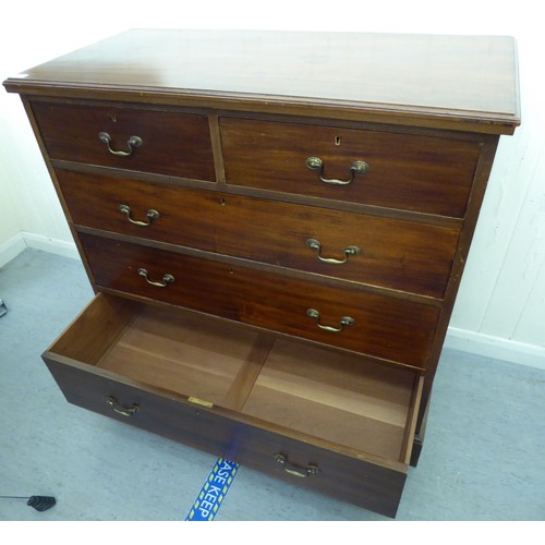 416 - An Edwardian mahogany five drawer dressing chest, on a plinth  41