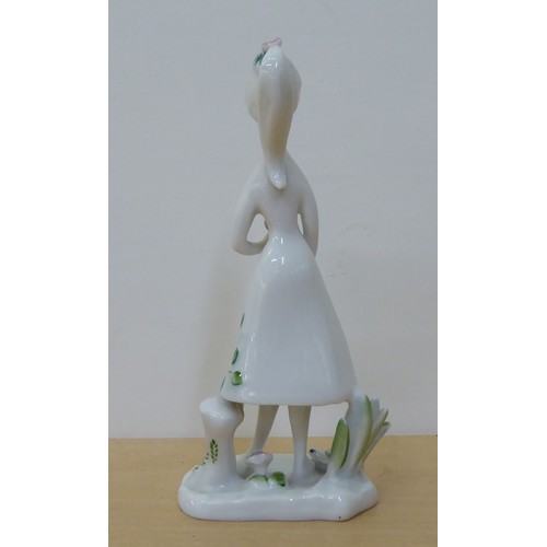 81 - A Rosenthal porcelain figure by Raymond Peynet, a girl with a ponytail  6.5