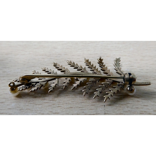 12 - A 9ct gold and pearl set, leaf design brooch