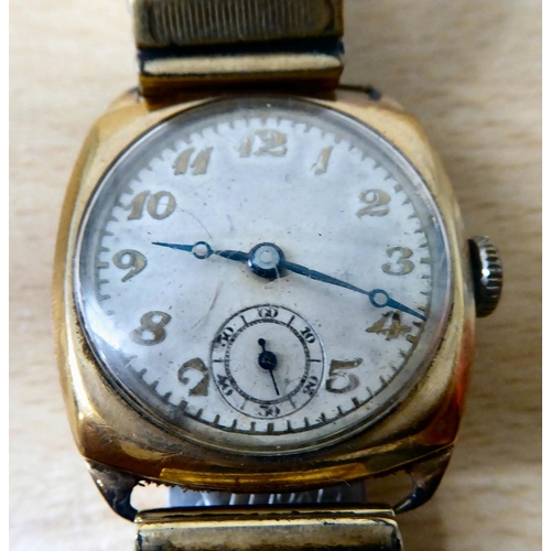 13 - A 9ct gold cased vintage wristwatch, faced by an Arabic dial, on a flexible gold plated, stainless s... 