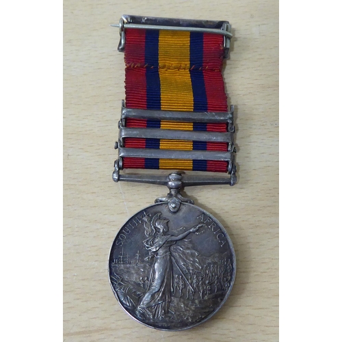 19 - A Queen Victoria South African medal, awarded to one Private J Pink of East Surrey Regt. on coloured... 