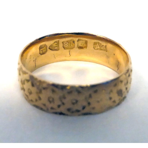 2 - A late Victorian 18ct gold floral engraved band ring 