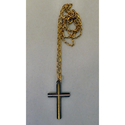 202 - A 9ct gold cross pendant, on a fine 9ct gold neckchain