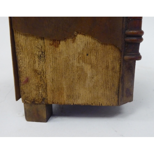 223 - A late 19thC walnut veneered cased mantel timepiece with turned, flank pilasters and a fretworked ga... 