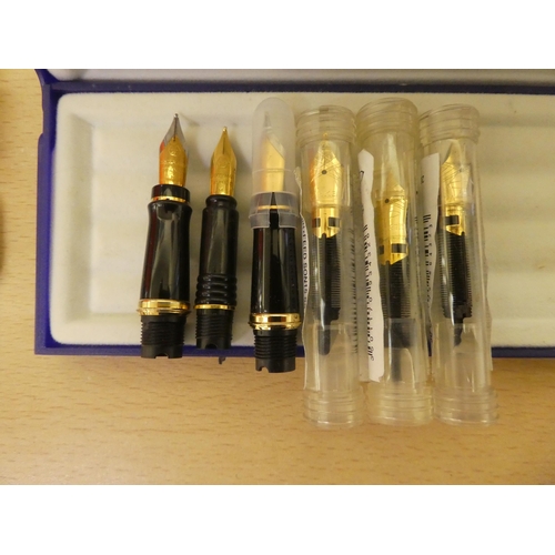 233 - Various Waterman, Parker and Cross boxes; and assorted pens, refills and nibs