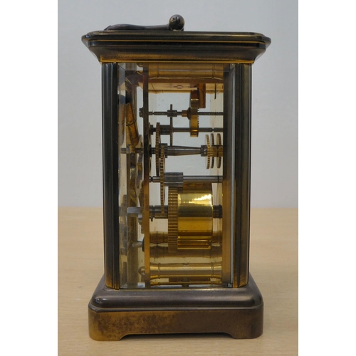 28 - A mixed lot: to include a Matthew Norman brass cased carriage clock, faced by a Roman dial  5