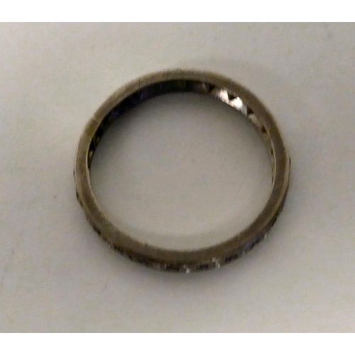 29 - A white metal and diamond set full eternity ring 