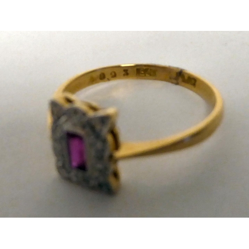 36 - An 18ct gold rectangular ruby and diamond set ring 