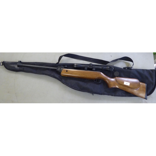 63 - A Webley Nimbus 1.77 air rifle with a sight