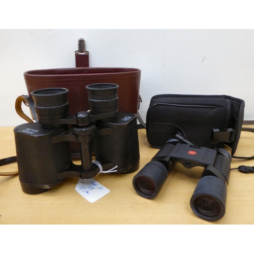 68 - A pair of Carl Zeiss Jena 8x30 binoculars; and another pair by Leica Trinovid  10