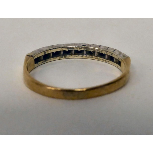 81 - A 9ct gold diamond set half eternity ring 