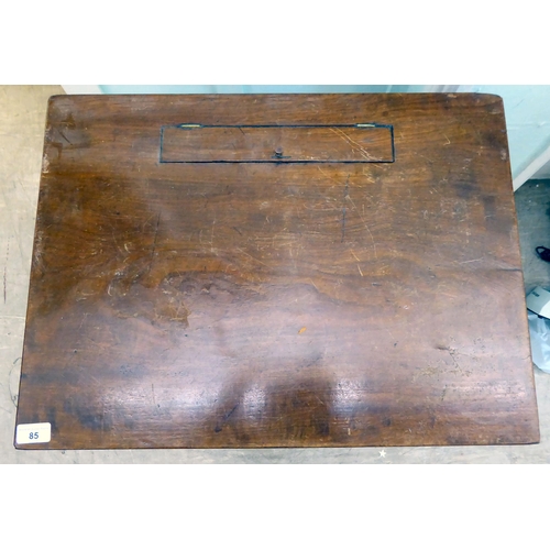 85 - A child's Victorian mahogany single drawer desk, raised on ring turned, tapered  legs  26