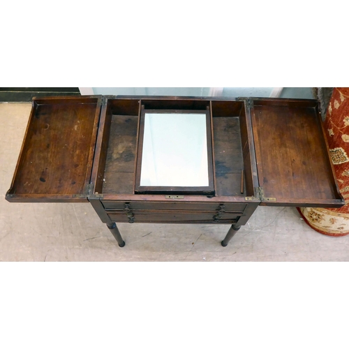 87 - A George III mahogany vanity unit with a pair of hinged flaps, revealing a mirror, over a brushing s... 