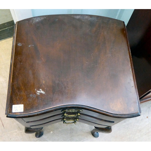 88 - An early 20thC mahogany drawer bedside chest on stand, raised on cabriole legs  32