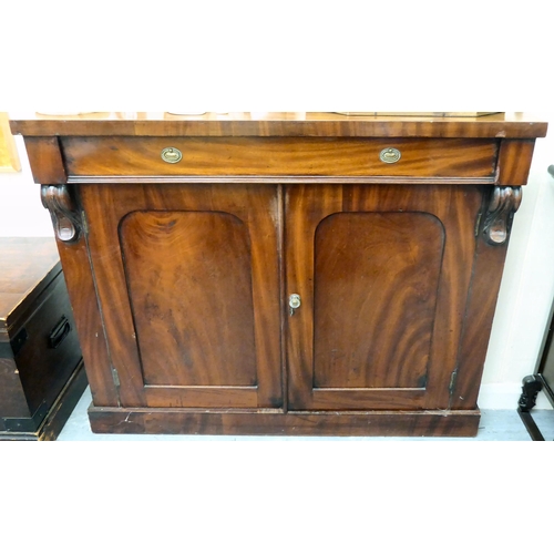 89 - A mid Victorian mahogany chiffonier with a pair of panelled doors, on a plinth  35