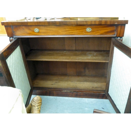 89 - A mid Victorian mahogany chiffonier with a pair of panelled doors, on a plinth  35