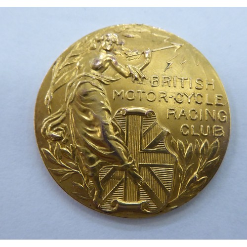 203 - A 9ct gold British Motorcycle Racing Club, engraved to celebrate the record holder of a 10 mile scra... 